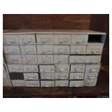 2 white metal organizers & all items inside