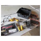 black toolbox,dewalt drill,bits,sabre saw,items