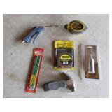 new tape measure,tiny hammer,tools