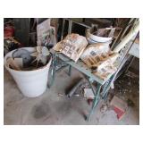 stand,barrell,nail aprons & items on top & inside