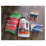 full bag of grass seed,mouse traps,gloves & item