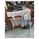 quilt rack & linens on it