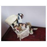 white wicker doll carriage & dolls