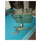 green metal container & tool