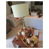 brass lamp,clock,bear candles,wall hangings,items