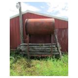 red overhead metal gas tank