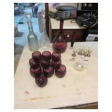 3 decanters,purple glasses,cruet & tiny glasses