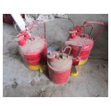 3 smaller metal gascans