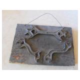 wall hanging of antique tools
