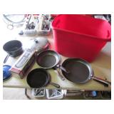 red tote,cast iron skillet,pans & thermos