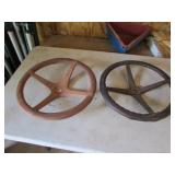 2 wooden steering wheels