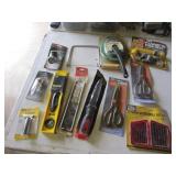 container,new drill bits,level,scissors & items