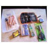 container,pencils,bits,divider tools,scissors,item
