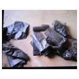 4 rolls of black trashbags & container