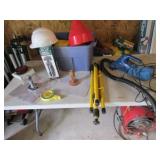 blue tote,yellow tripod,hand vac,hardhat & items