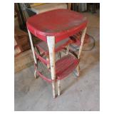 red metal stepstool