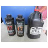 3 partial jugs of gun powder