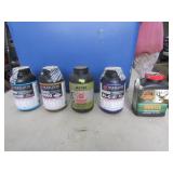 5 partial jugs of gun powder