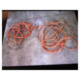 2 orange ext. cords