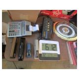 adding machine,clocks,staplers