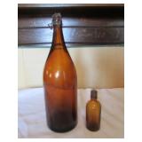 2 old amber bottles