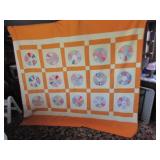 quilt has couple tears)