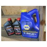 3 half full oil jugs