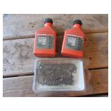 used chain & 2 stihl jugs of 2 cycle engine oil