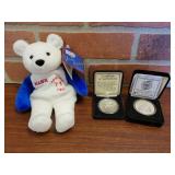 Two Commemorative Sports Coins And A Stuffed Bear
