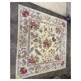 vintage floral rug measures 68x68"