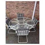 glass top outdoor table and 4 chairs