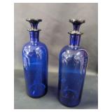 pair of cobalt blue stoppered bottles