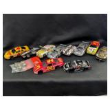 8 slot cars and 2 extra bodies