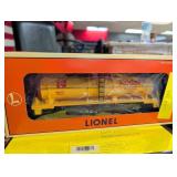 Lionel train car, floodlight tower, pumping
