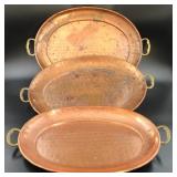 Three  Oval Hammered Copper Trays