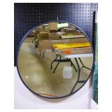 28" round black framed mirror