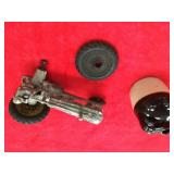 Old john deere toy tractor and mini jug