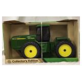 ERTL John Deere 4 wheel drive Tractor.