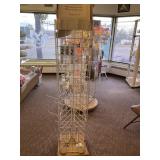 3 sided, 64" tall  rotating merchandiser with hook