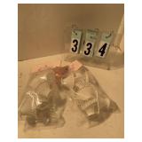 2 pkgs of white small baskets