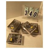 6 boxes of flower pins