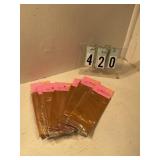 7 pkgs of 10 gold treat bags