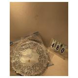 4 pkgs of 12 silver doilies