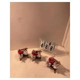 3 sets of doves on a bench