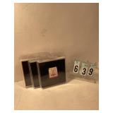 3 pkgs of black foil wrappers