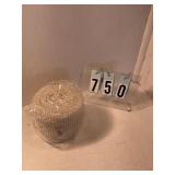 Giant roll of pearls