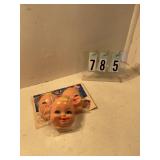 3 baby doll faces