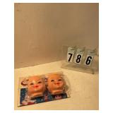 2 baby doll heads