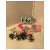 9 assorted pkgs of cupcake toppers