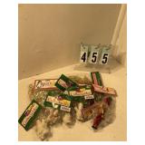 Assorted Christmas ornaments and gold garland